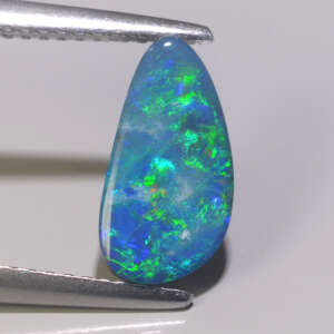 1.25CT Pinfire Red Opal Doublet