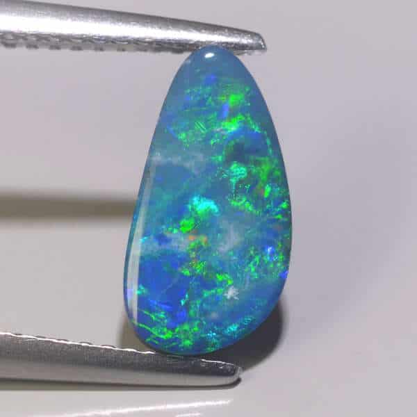 1.25CT Pinfire Red Opal Doublet